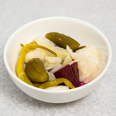 a Reuben sandwich on wax paper.